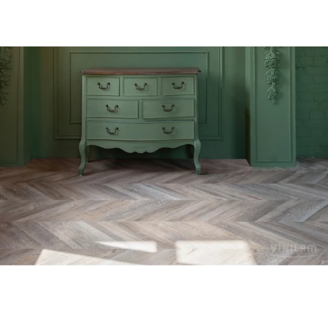 Виниловый ламинат Vinilam Parquet Chevron Шампань RI153616CL4 Виниловый ламинат Vinilam Parquet Chevron Шампань RI153616CL4