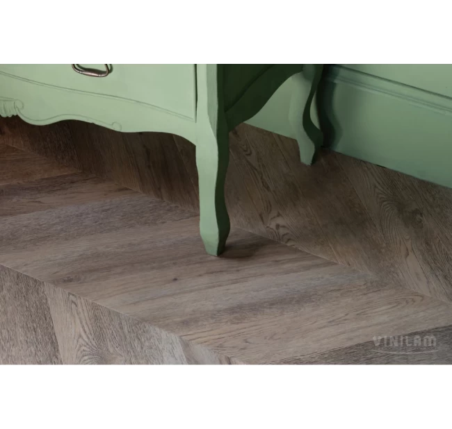 Виниловый ламинат Vinilam Parquet Chevron Шампань RI153616CL4 Виниловый ламинат Vinilam Parquet Chevron Шампань RI153616CL4